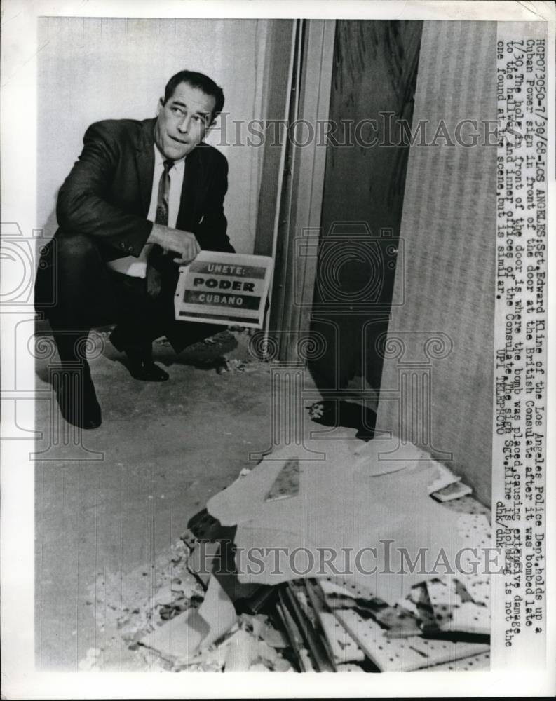 1968 Press Photo Los Angeles Edward Kline Police Cuban Power Sign British Bomb - Historic Images