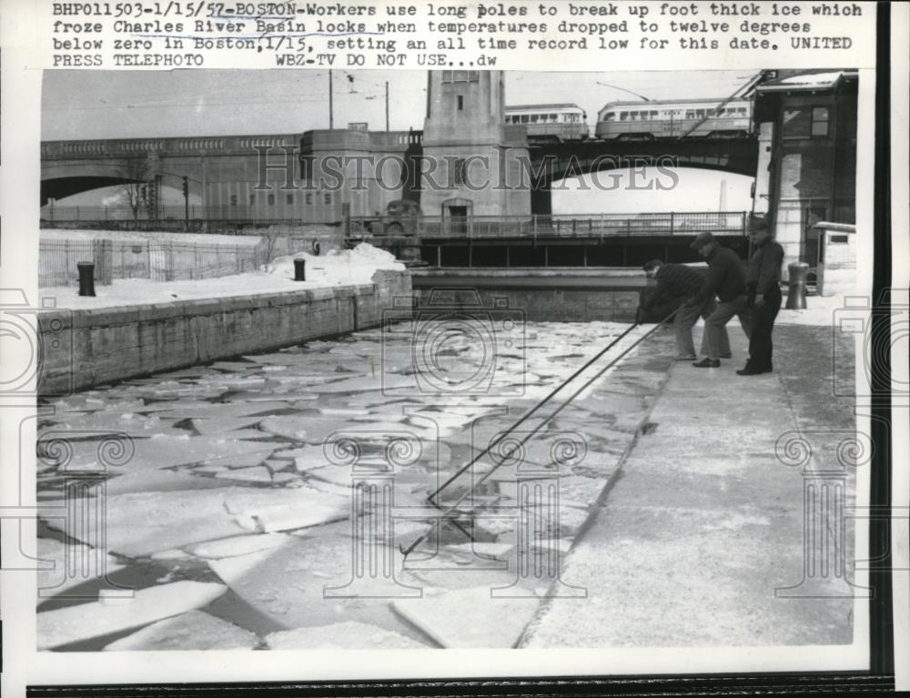 1957 Press Photo Workers Use Poles To Break Up Foot Thick Ice - Historic Images