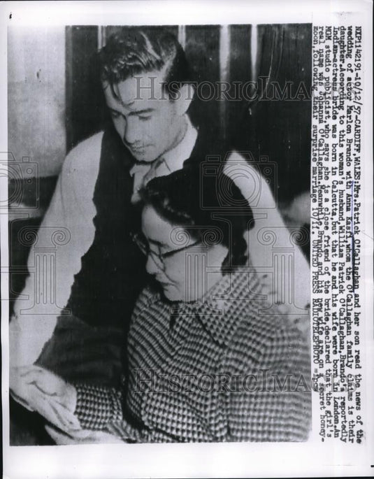 1957 Press Photo Mrs. Patrick O'Callaghan & her son read news of wedding - Historic Images