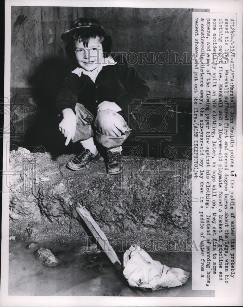 1951 Press Photo Marshall John Mauldin with puddle that saved his life - Historic Images