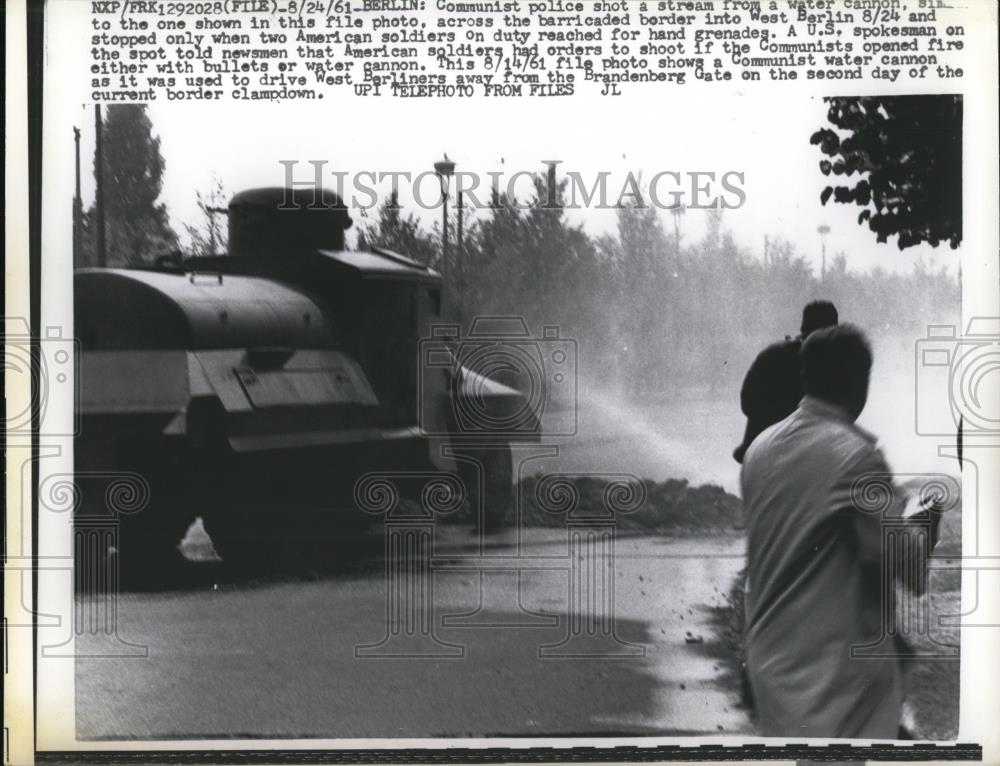 1961 Press Photo Berlin Communist police shoot a stream from a water cannon - Historic Images