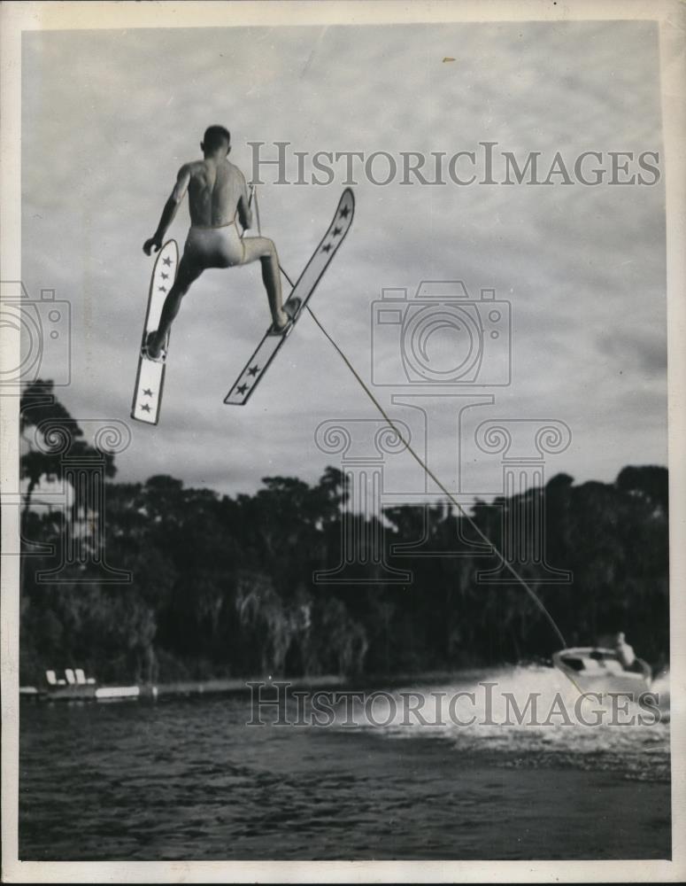 1948 Press Photo Buddy Boyle soars over the water - Historic Images