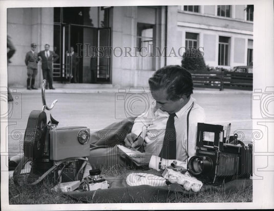 1954 Press Photo Geneva waiting is the most tedious and time consuming part of - Historic Images