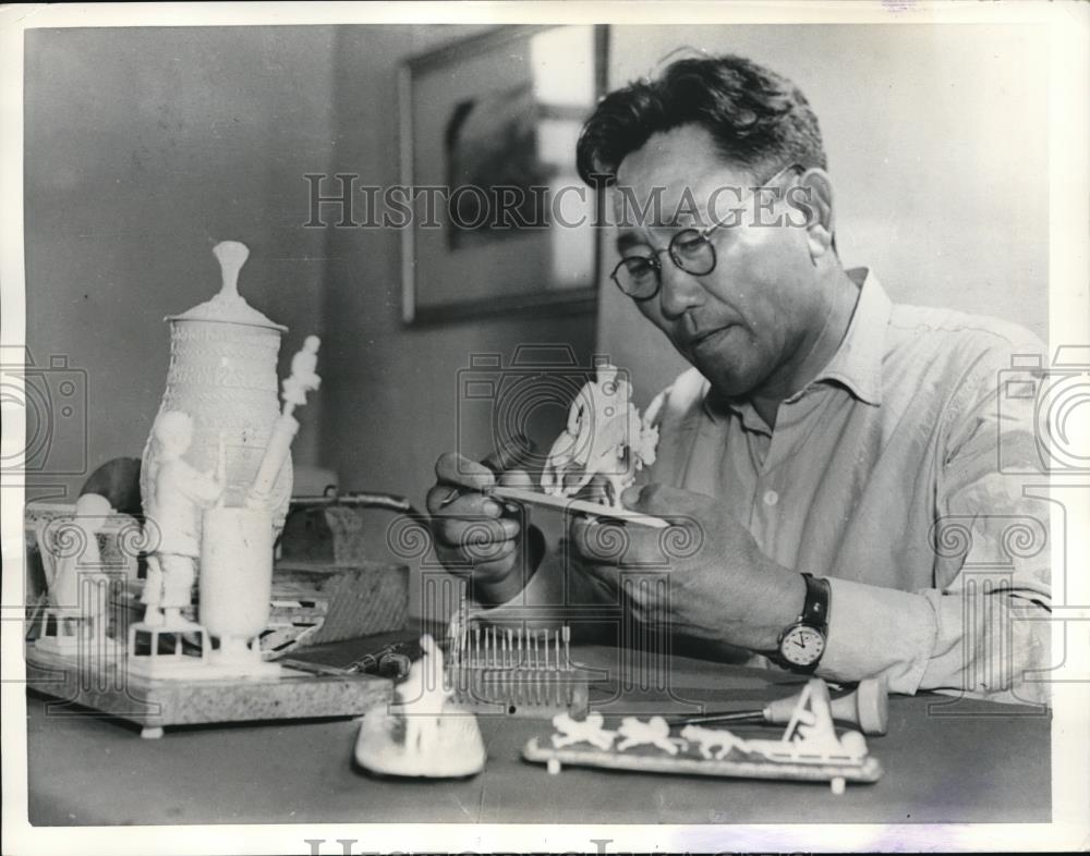 1958 Press Photo Terent Ammosov carries on the ancient art of bone-carving - Historic Images