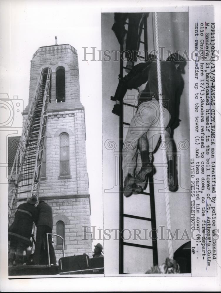 1957 Press Photo Donald W. Sanders barricaded in St. Anthony&#39;s Catholic Church - Historic Images