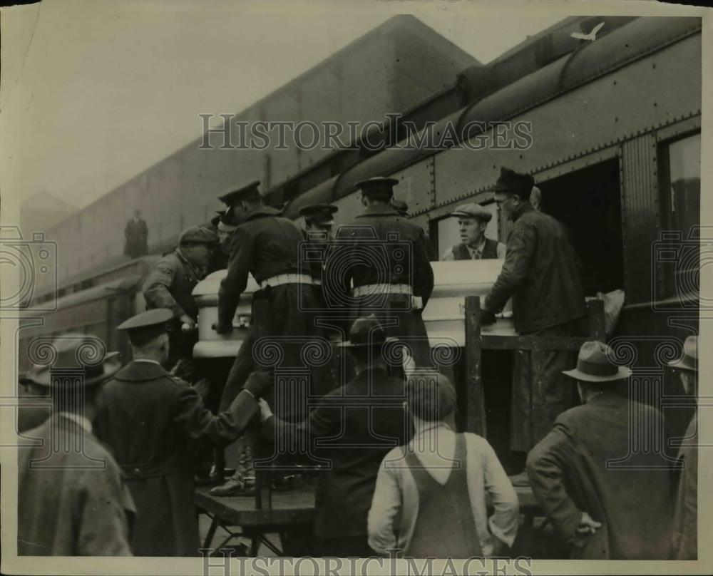 1929 Press Photo Funeral-Caskets Loaded on Train - Historic Images