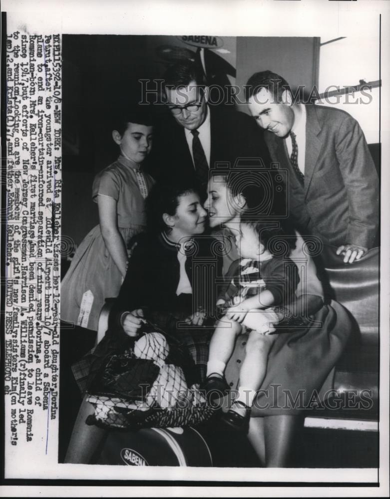 1956 Press Photo Mrs Rita Kelleher kisses her 12 yr old daughter Dorina after - Historic Images