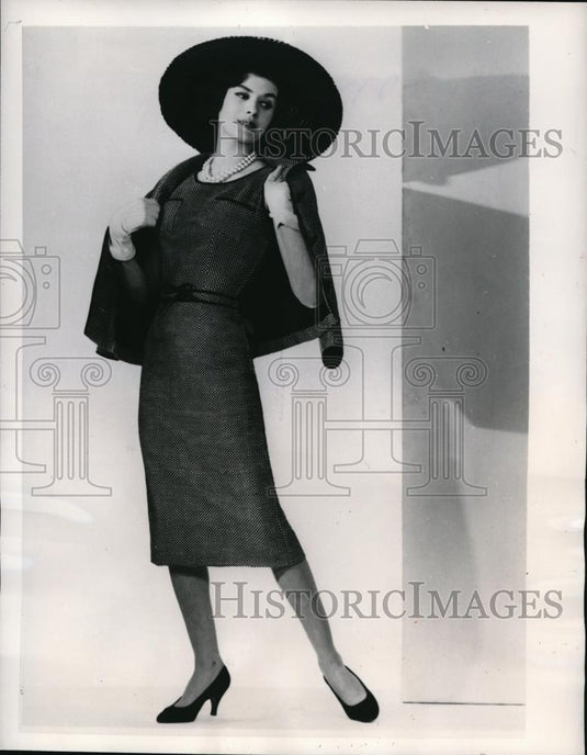 Jean Patou who uses a perky black and white checked wool for this smart ensemble - Historic Images