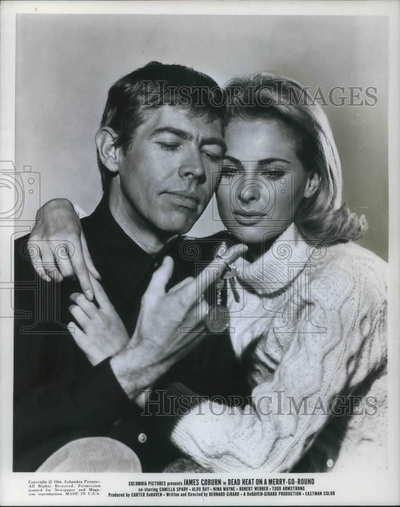 1966 Press Photo James Coburn and Camilla Sparv in Dead heat on a Merry-Go-Round - Historic Images