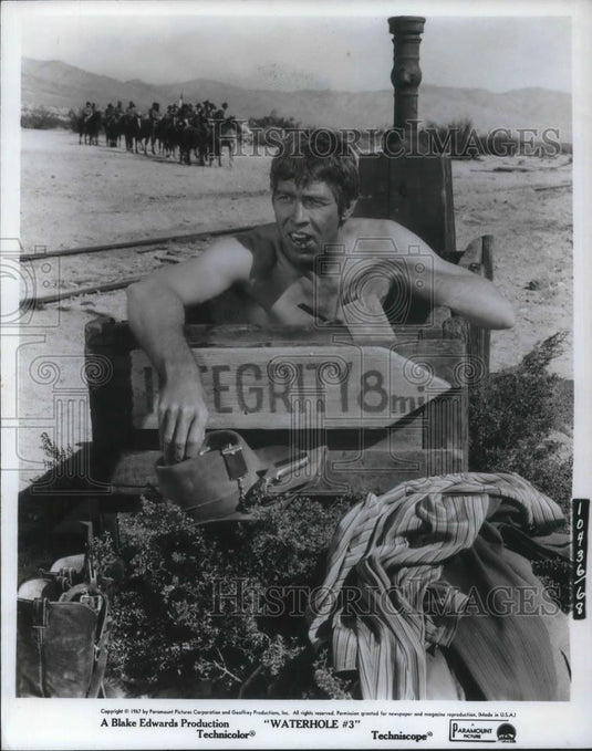 1967 Press Photo James Coburn in Waterhole