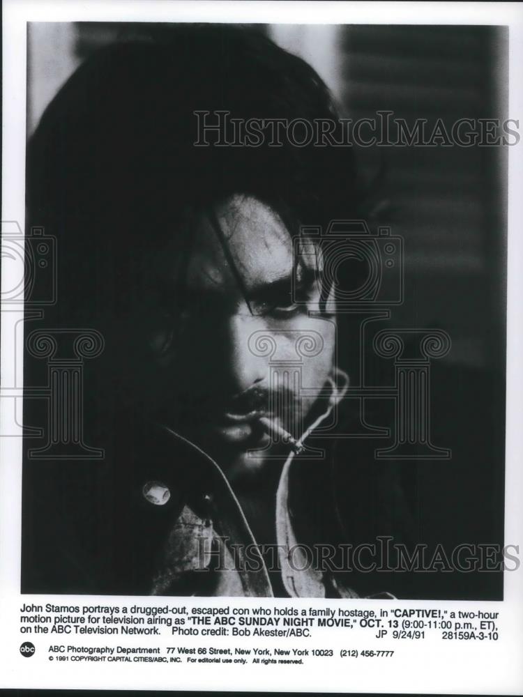 1991 Press Photo John Stamos stars in Captive - cvp08849 - Historic Images