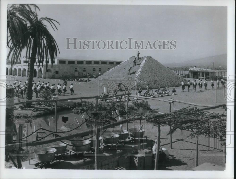 1965 Press Photo Scene from The Hill Movie World War II Punishment Rock Sand - Historic Images
