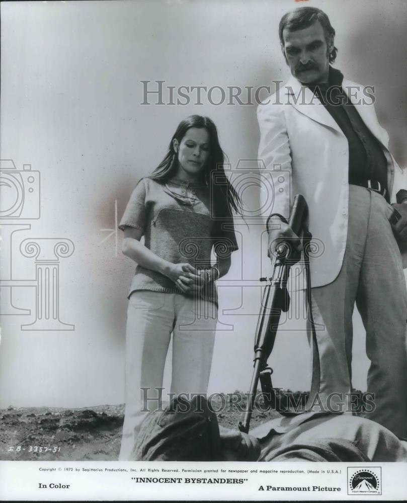 1973 Press Photo Geraldine Chaplin & Stanley Baker in Innocent Bystanders - Historic Images
