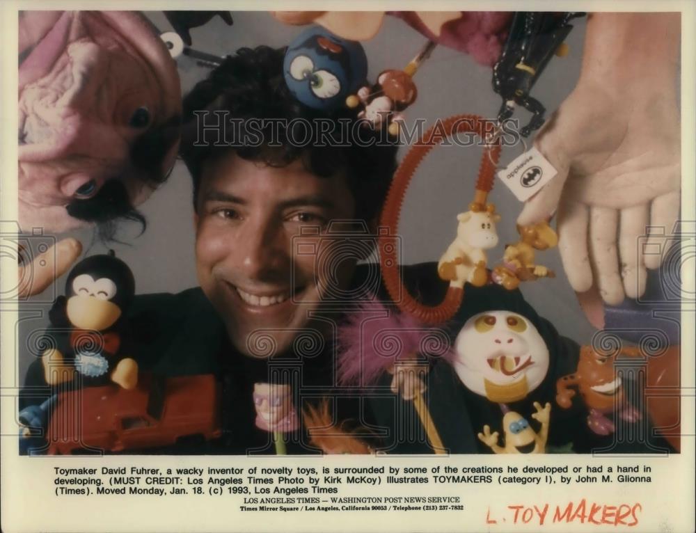 1993 Press Photo Toymaker David Fuhrer surrounded by his creations - cvp15834 - Historic Images