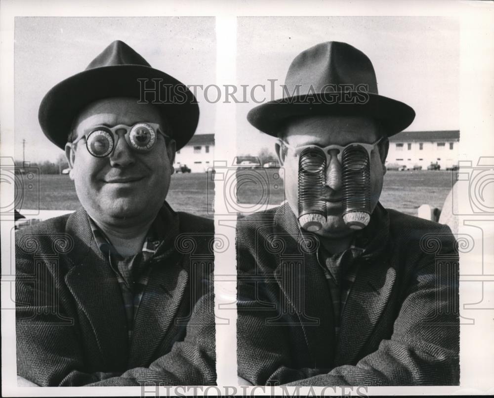 1957 Press Photo Ralph Santos gagging up with the trick glasses - Historic Images