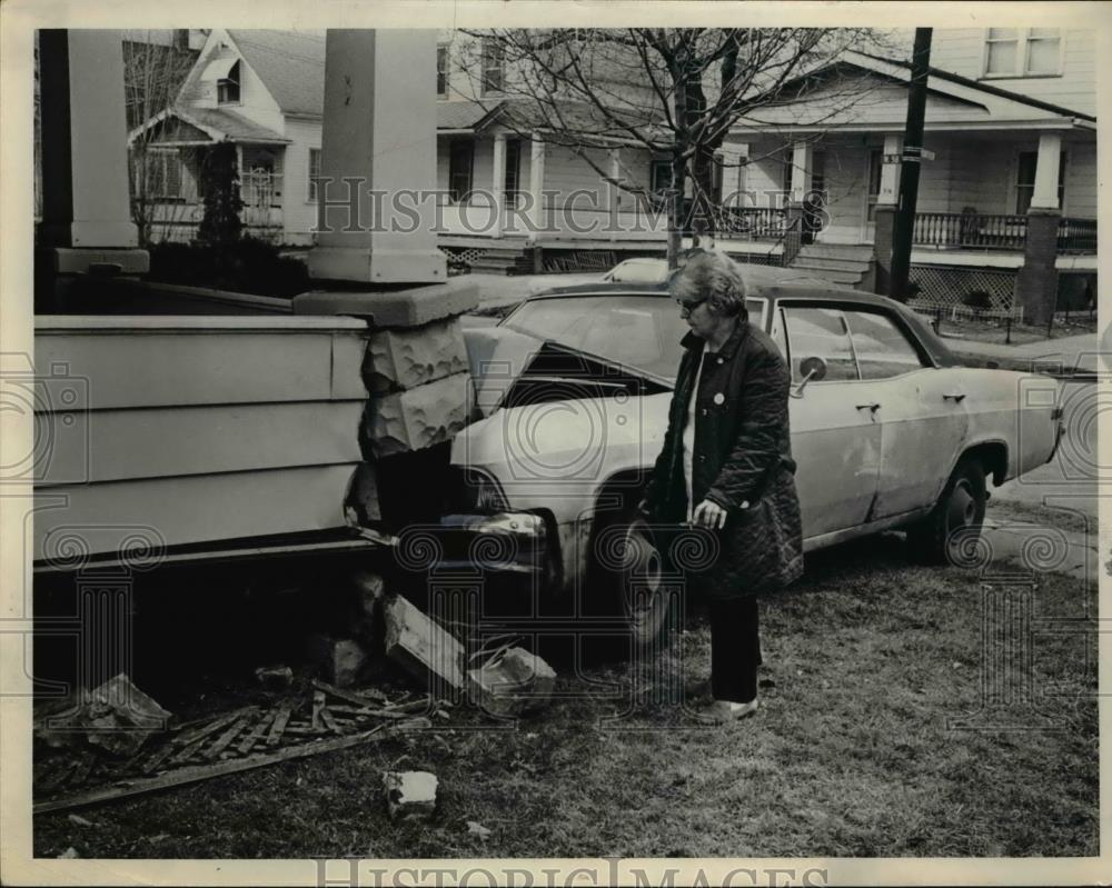 Undated Press Photo A woman after crashing her car into a house - Historic Images