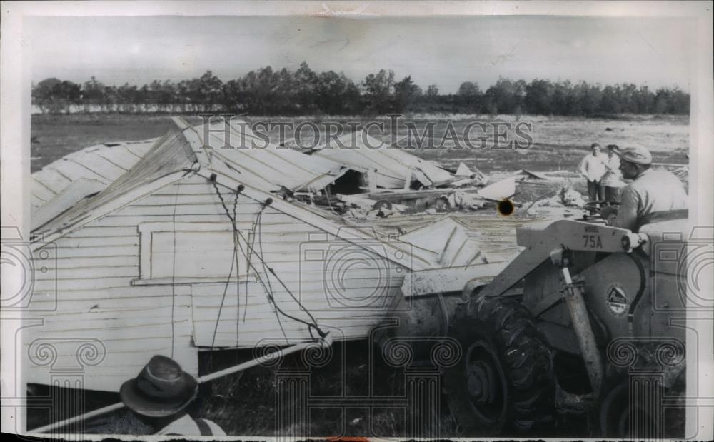 Bulldozer clears debris after a tornado in Bryan Texas - Historic Images