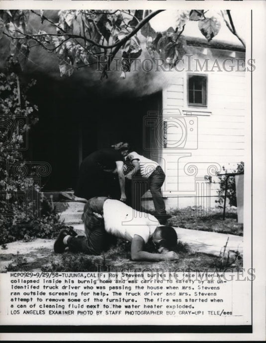 1958 Press Photo Roy Stevens was rescued from his burning house - Historic Images