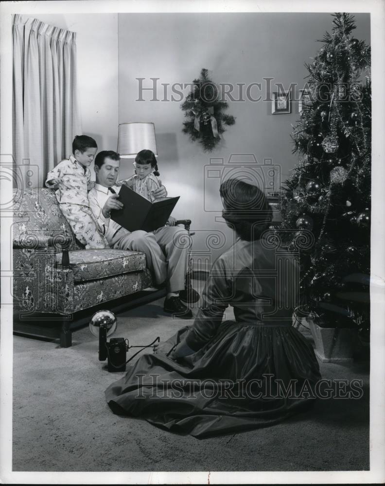 1956 Press Photo Informal Snapshot of a Family During Christmas - Historic Images