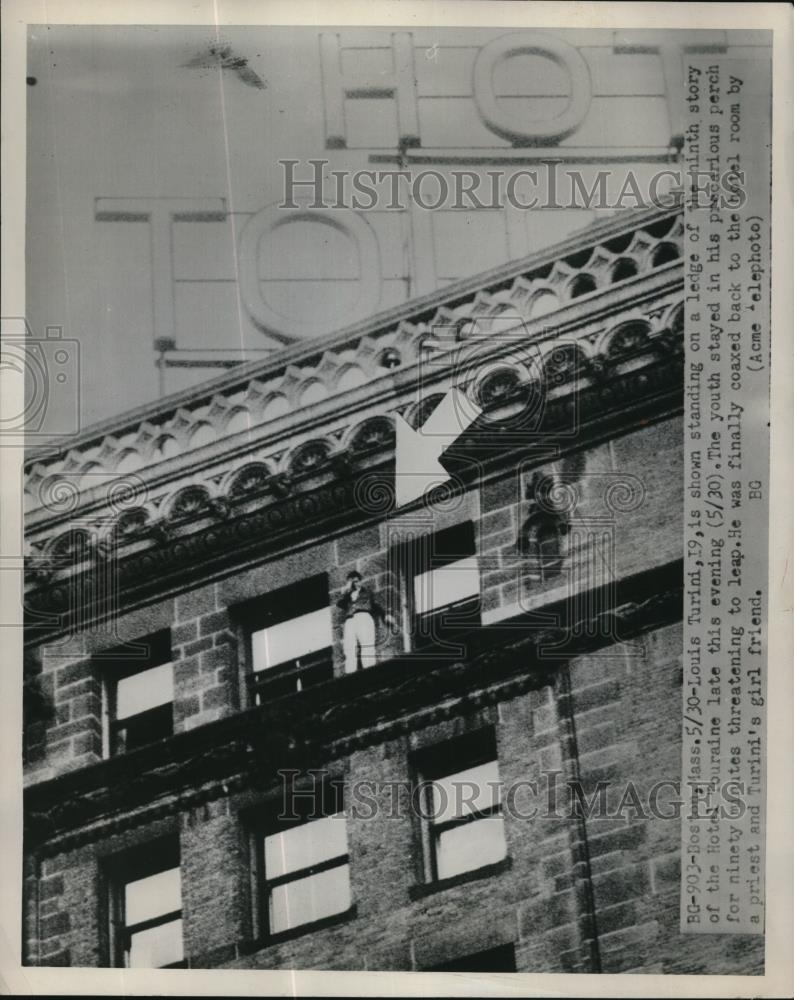 1954 Press Photo Boston-Louis Turini is shown standing on ledge of the ninth - Historic Images