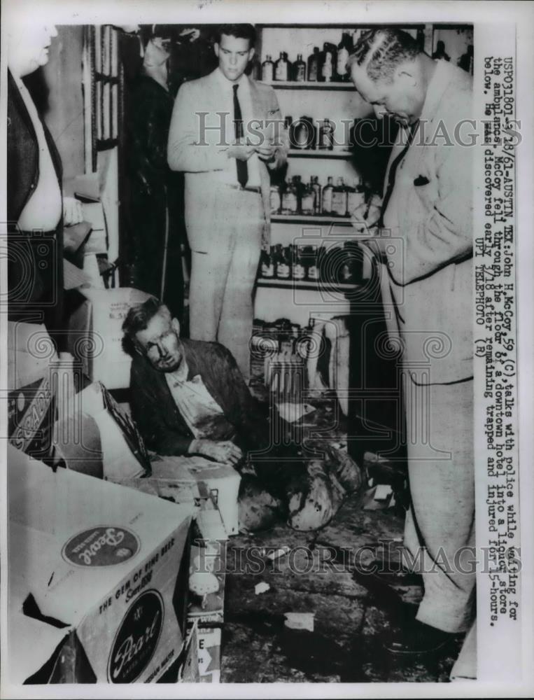 1961 Press Photo John McCoy Waits for the Ambulance - Historic Images