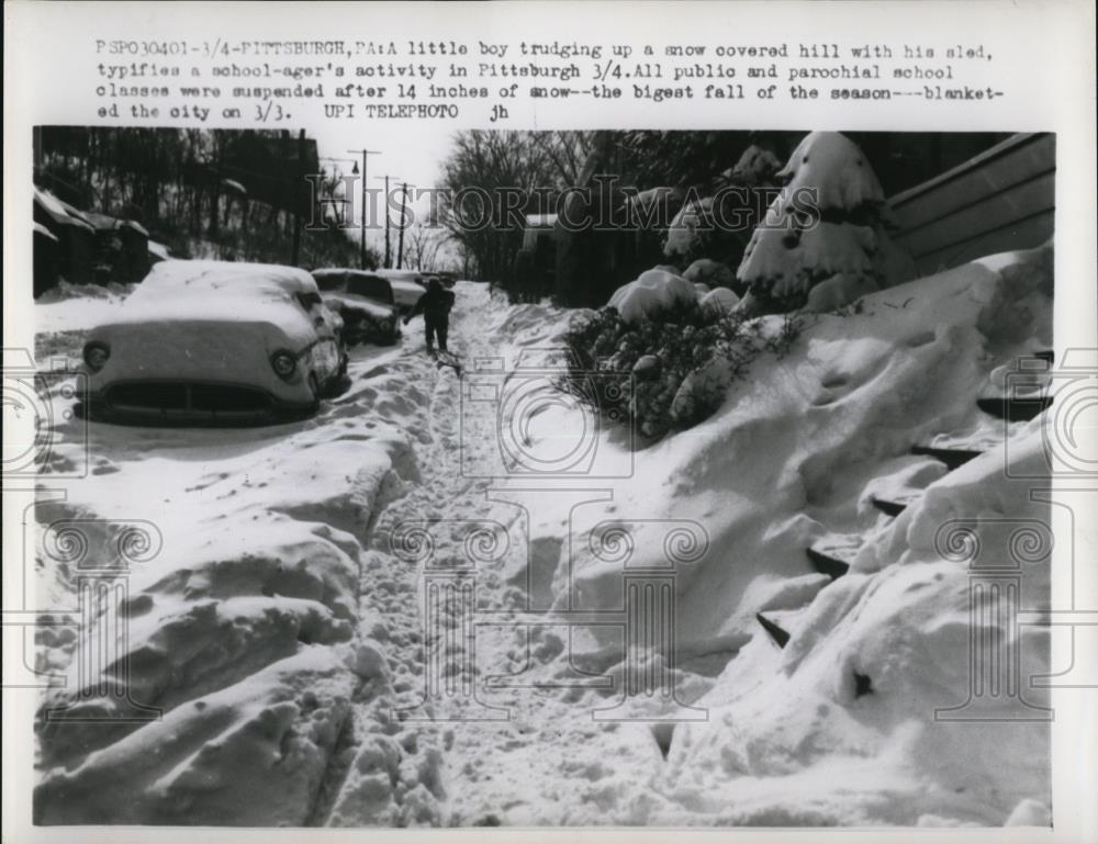 1960 Press Photo Classes are suspended due to biggest fall of the season - Historic Images