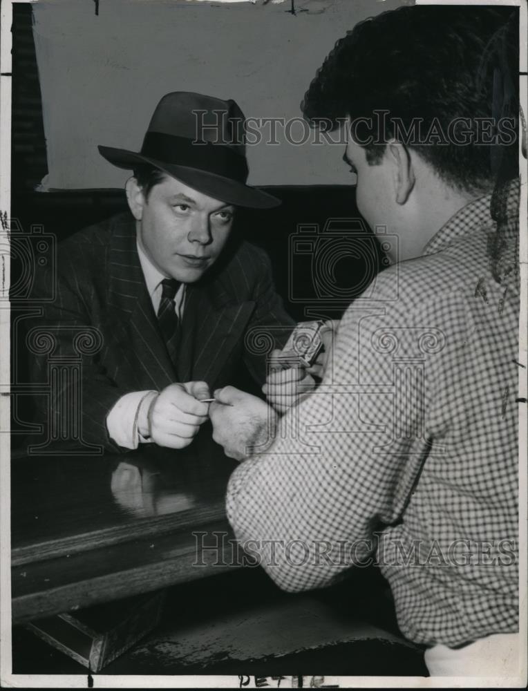 1947 Press Photo Peter Bellamy Taxes on Cigarettes - Historic Images