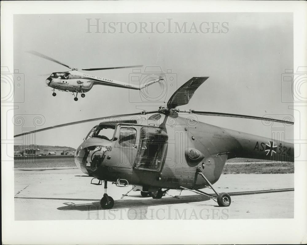 1957 Press Photo Sycamore helicopter in German markings &amp; in British markings - Historic Images