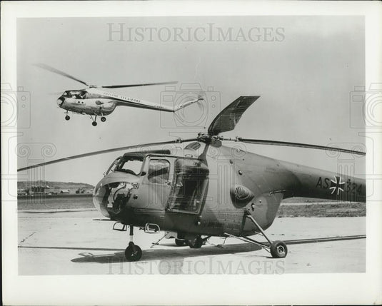 1957 Press Photo Sycamore helicopter in German markings & in British markings - Historic Images