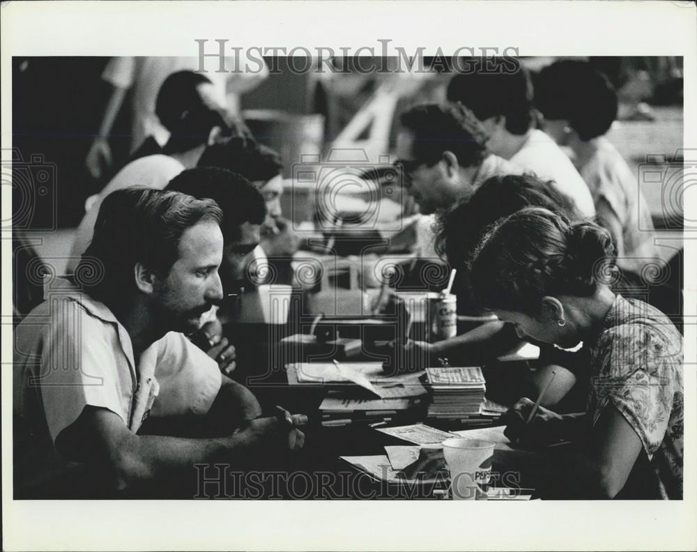 Press Photo Cuban Refugees Answer Questions For Immigration Workers - Historic Images