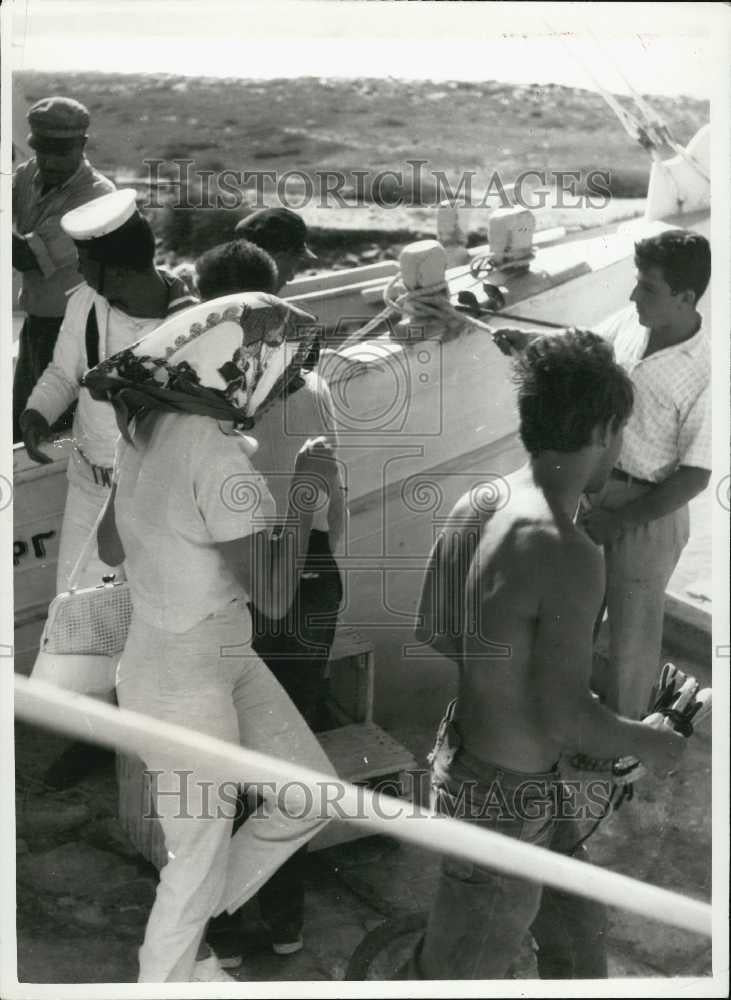 Press Photo Princess Soraya Of Greece Disembarking Rescue Boat After Yacht Wreck - Historic Images