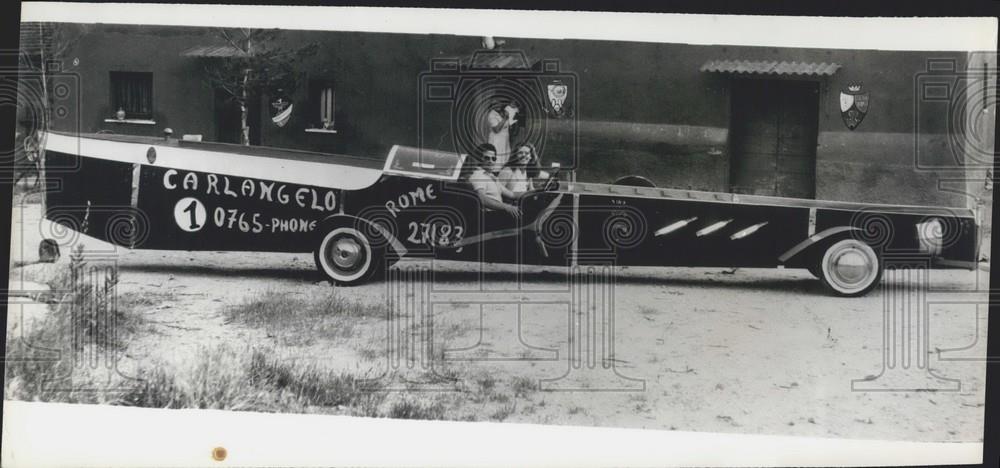 Press Photo Italian sculptor, Carlangelo,in his long car - Historic Images