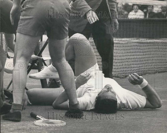 1966 Press Photo Roy Emerson pictured on the ground at tennis match - Historic Images