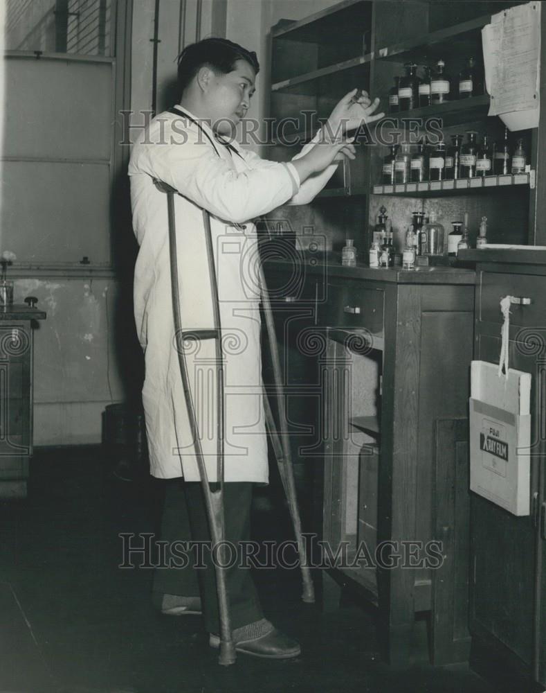 Press Photo Dr Courageous Dr. Watanbe Mixing His Own Prescriptions - Historic Images