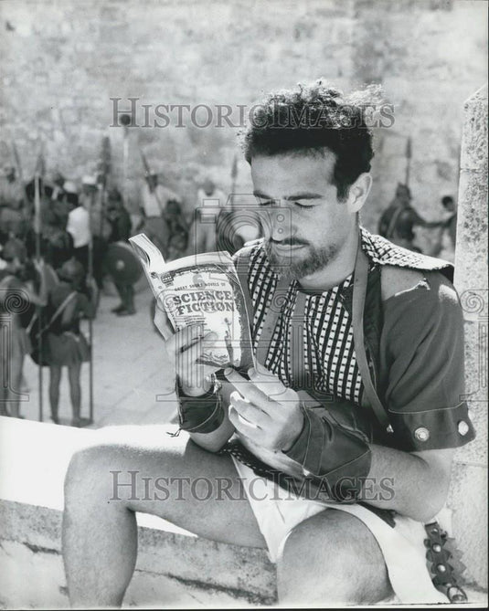 Press Photo Hebrew University Student Portraying Soldier Reading Book On Set - Historic Images
