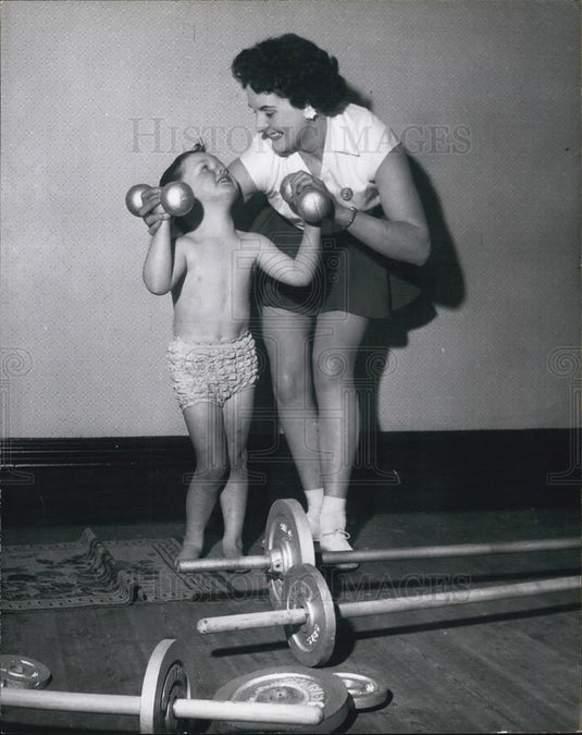 Press Photo Little Michael & mother,Jean Leamey  handling dumb-bells, - Historic Images