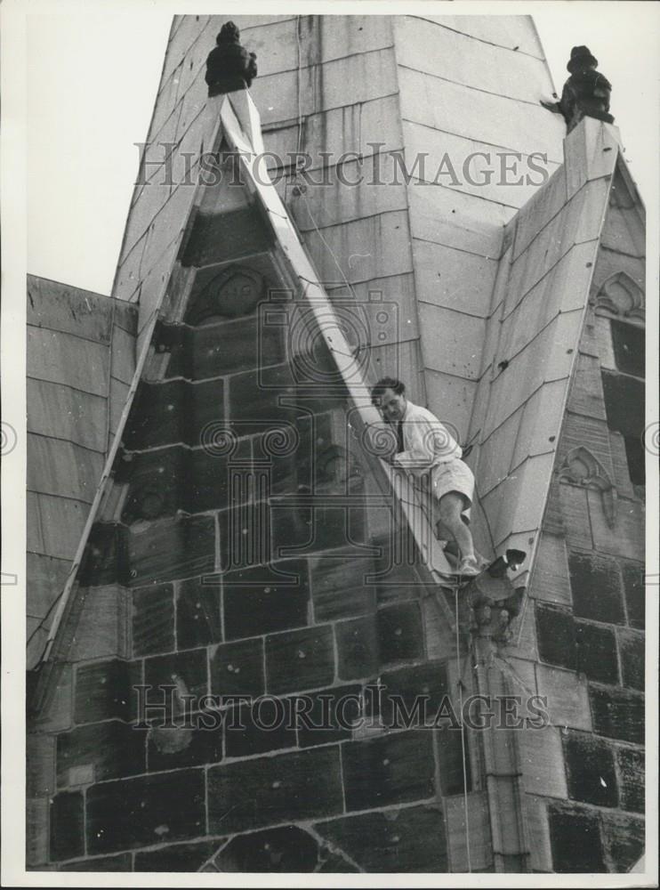 Press Photo Guenther on his dangerous way up to the top of St. Lorenz Church - Historic Images