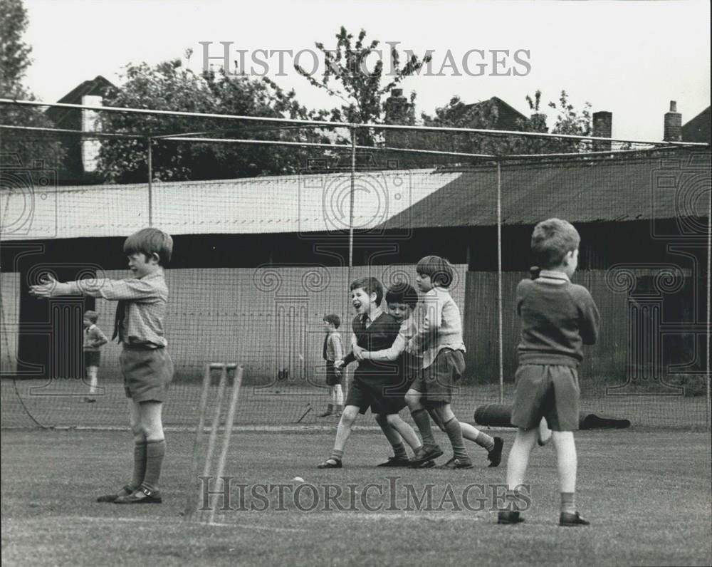 Press Photo Viscount Linley Wrestling With Classmates During Cricket Game - Historic Images