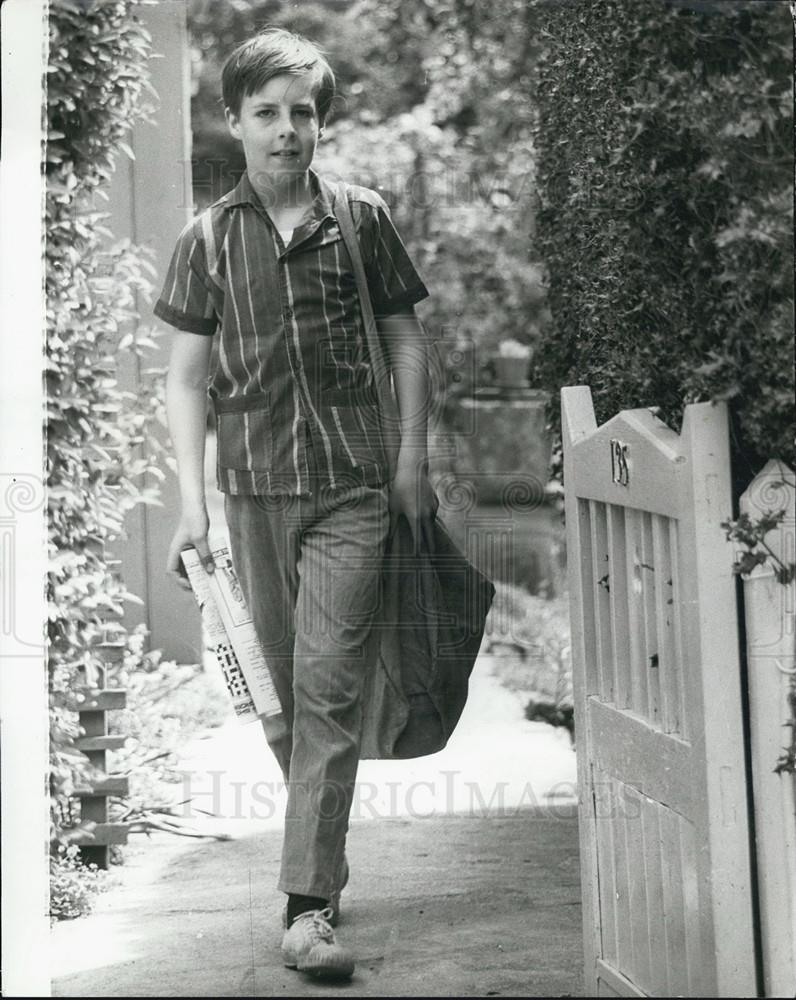 Press Photo Christopher Delivering Papers to Raise Money for Flying Lessons - Historic Images