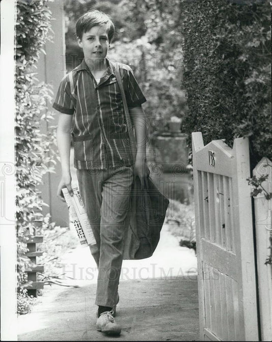 Press Photo Christopher Delivering Papers to Raise Money for Flying Lessons - Historic Images