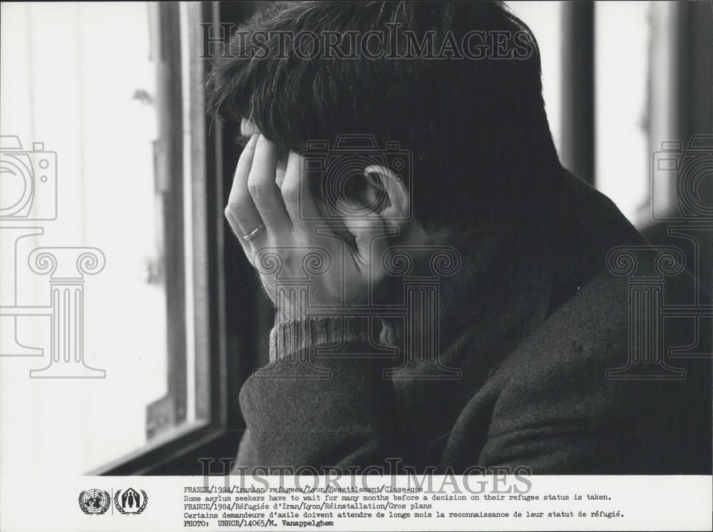 Press Photo Iranian Refugee waiting to hear the decision on his refugee status - Historic Images