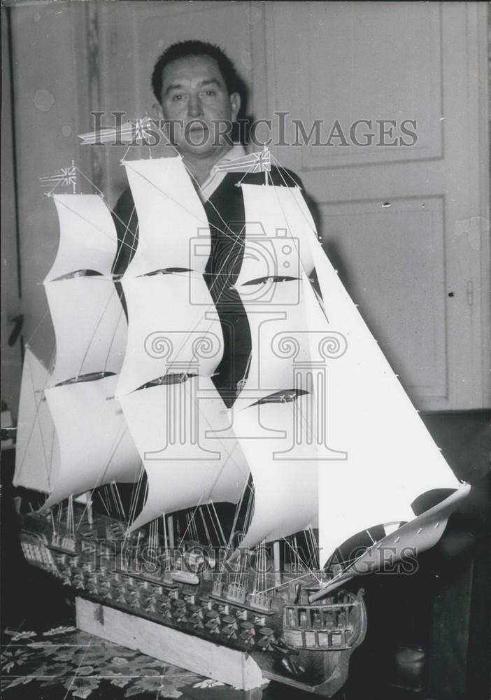 Press Photo Miner builds small scale frigate ship - Historic Images