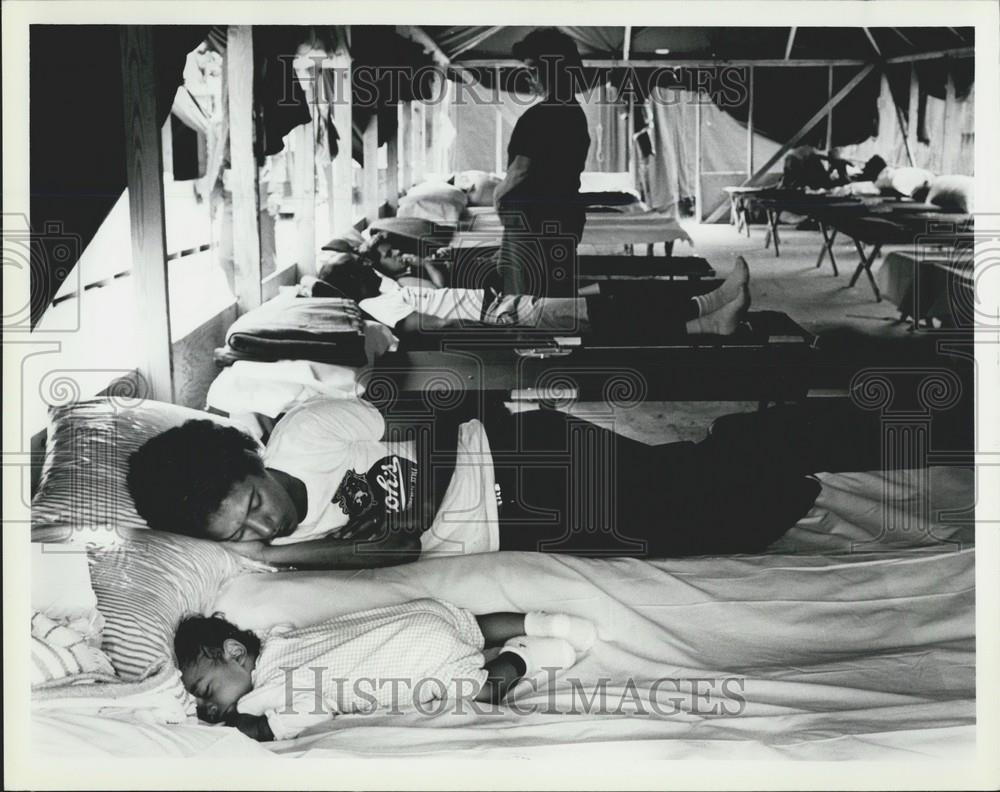 1962 Press Photo Father &amp; Son Sleep In Temporary Canvas Home - Historic Images