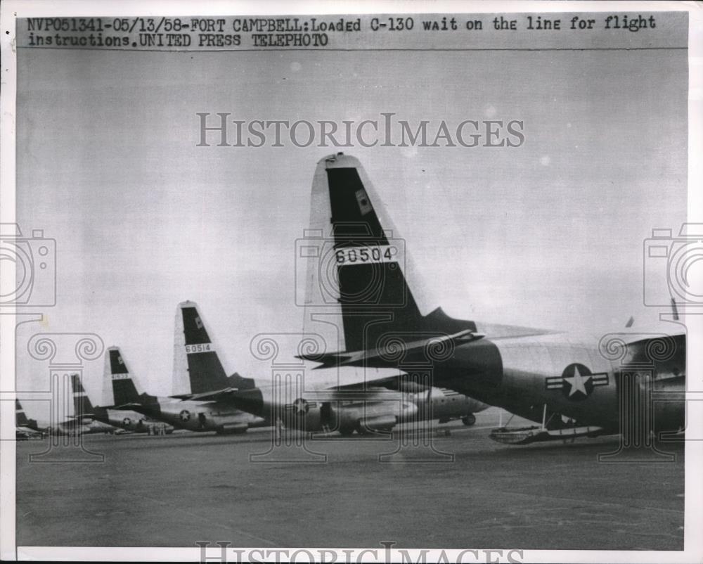 1958 Press Photo Loaded C-130 wait on the line for Take off Instruction. - Historic Images