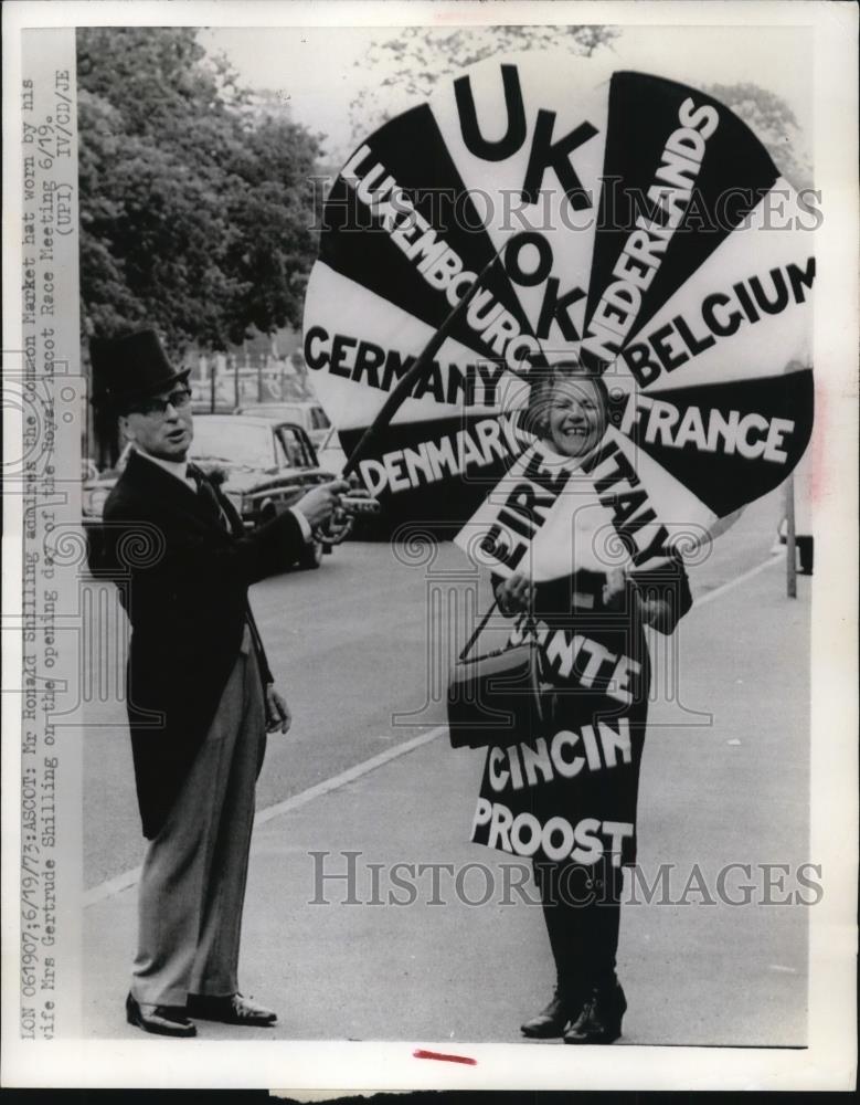 1973 Press Photo of Mr. Ronald Shilling admires the common market hat worn by - Historic Images