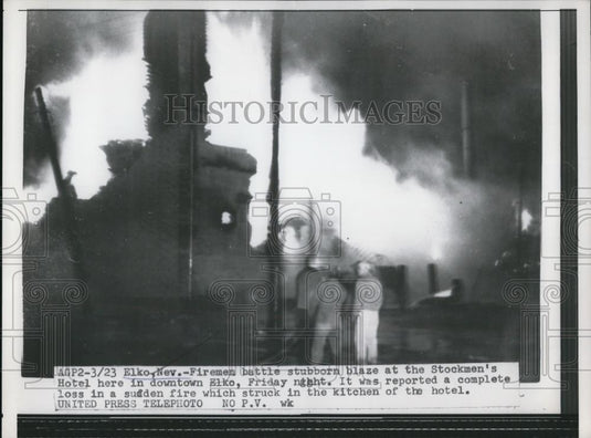 1957 Press Photo Firemen fighting a blaze at the Stockmen's Hotel - Historic Images
