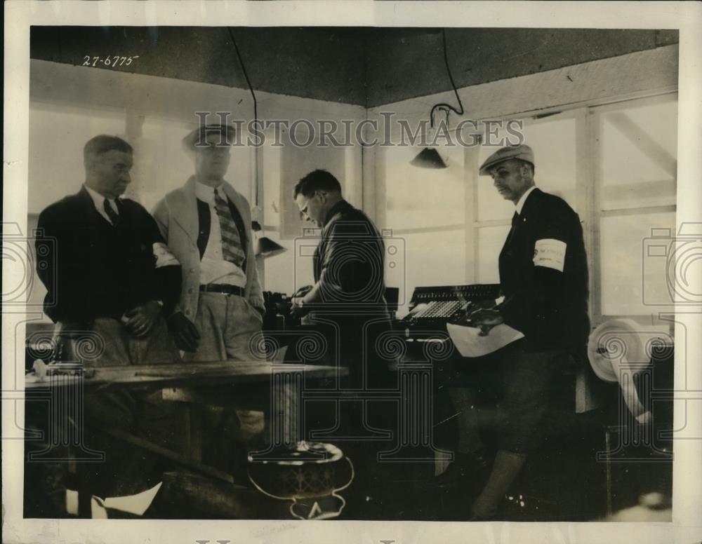 1928 Press Photo Checking Electronic Timing Devices - Historic Images