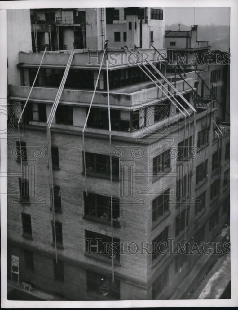 1953 Press Photo Office building sprout new crop of stove pipes crawls up - Historic Images