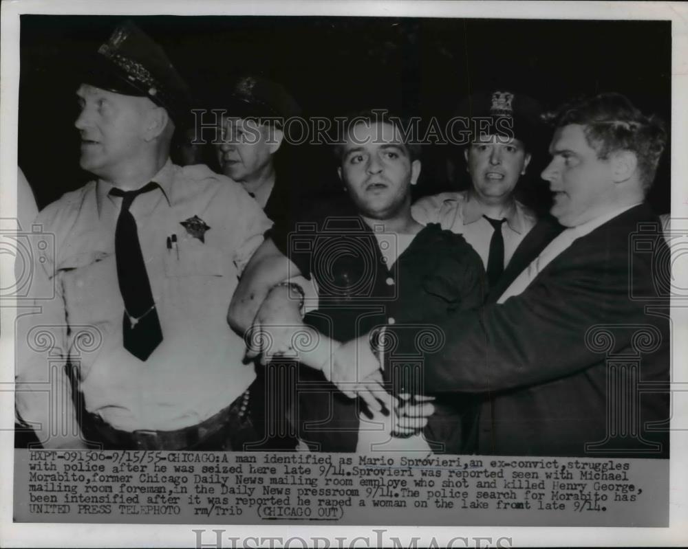 1955 Press Photo Mario Sprovieri, struggles with police after he was seized - Historic Images