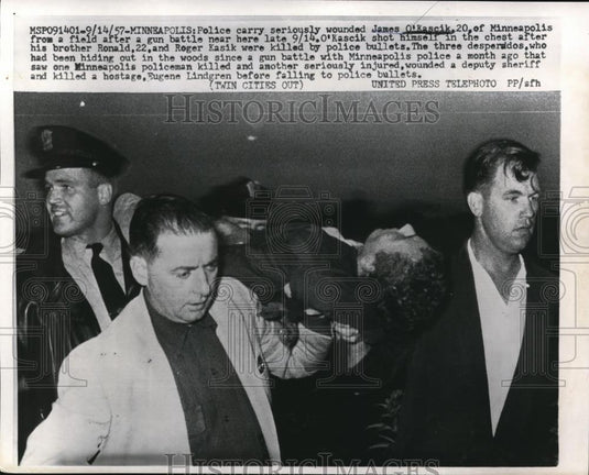1957 Press Photo Police carry wounded James O'Kascik after a gun battle - Historic Images